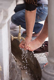 Turkish Muslim Man washing Feet