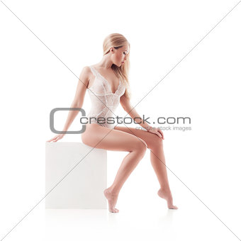 blond woman with long hair in white underwear