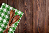 Kitchen cooking utensils over wooden table