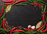 Chili pepper, peppercorn, garlic and bay leaves