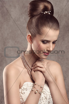 elegant girl with pearls 