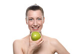 Pretty Woman Holding Green Apple Against White