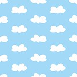 Tile vector pattern with white clouds on blue sky background.