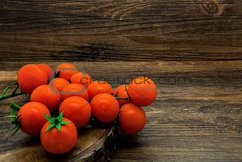 Cherry tomatoes on a rustic background