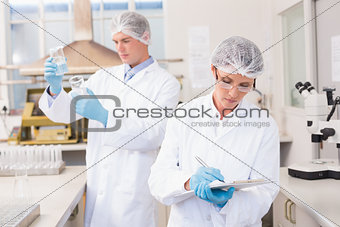 Scientists working attentively