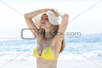 Happy pretty blonde in bikini relaxing
