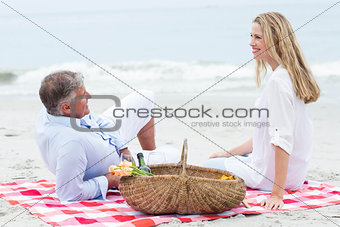 Happy couple having picnic