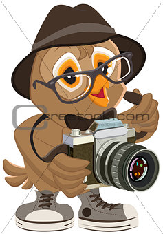 Owl hipster in hat and sunglasses holding retro camera. Bird photographer