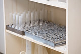 Tray with test tubes at the shelf