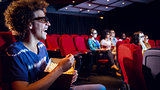 Young friends watching a 3d film