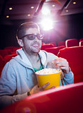 Young man watching a 3d film