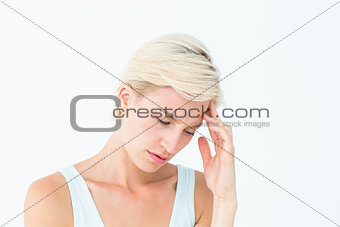 Pretty woman suffering from headache