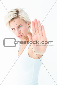 Angry pretty blonde showing her hand