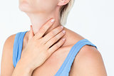 Blonde woman suffering from throat pain