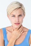 Woman with throat pain looking at camera
