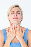 Woman with throat pain looking at camera