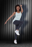 Composite image of fit woman doing aerobic exercise