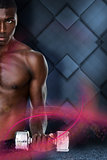 Composite image of serious fit shirtless young man lifting dumbbell