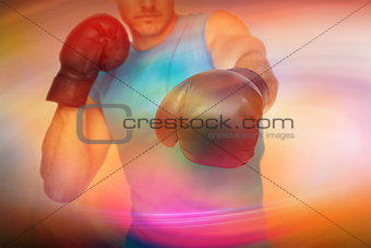 Composite image of close-up of a determined male boxer focused on training