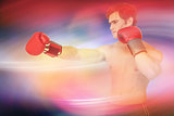 Composite image of muscly man wearing red boxing gloves and punching