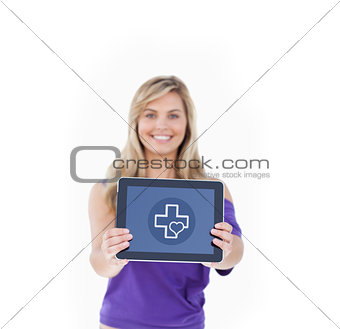 Composite image of tablet computer being held by a blonde woman