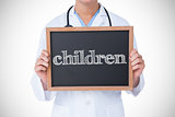 Children against doctor showing little blackboard