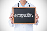 Empathy against doctor showing little blackboard