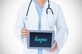Hope against doctor showing tablet pc