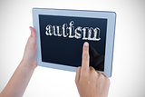 Autism against woman using tablet pc