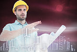 Composite image of architect with blueprint gesturing on white background