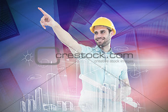 Composite image of male architect with blueprints pointing away