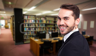 Composite image of elegant businessman in suit smiling at camera