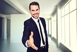 Composite image of portrait of smiling businessman offering handshake