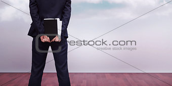 Composite image of businesswoman holding diary