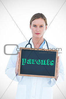 Parents against doctor showing chalkboard