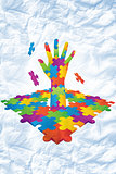Composite image of autism awareness hand