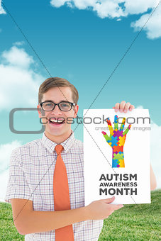 Composite image of geeky hipster smiling and showing card