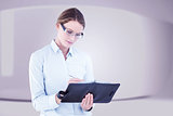 Composite image of businesswoman writing in her diary