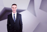 Composite image of smiling businessman in suit with hands in pocket posing