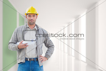 Composite image of architect looking at camera