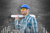 Composite image of smiling architect looking away while holding blueprint