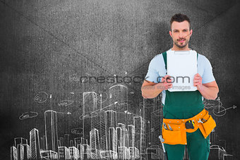 Composite image of repairman showing clipboard