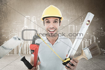 Composite image of portrait of happy worker holding various equipment
