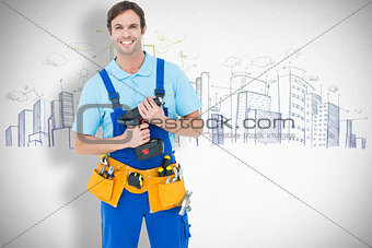 Composite image of confident carpenter holding drill machine