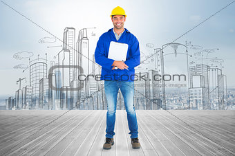 Composite image of full length portrait of happy manual worker with clipboard