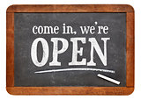 Come in, we are open blackboard sign