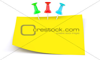 Yellow sticker with drawing pins