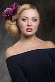 woman with elegant floral hairdo 