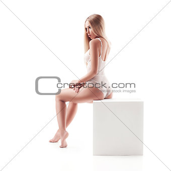 blond woman with long hair in white underwear