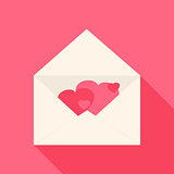 Open envelope with hearts inside